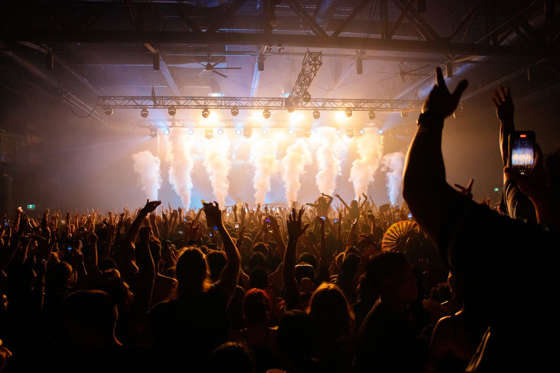Crowd under stage lights