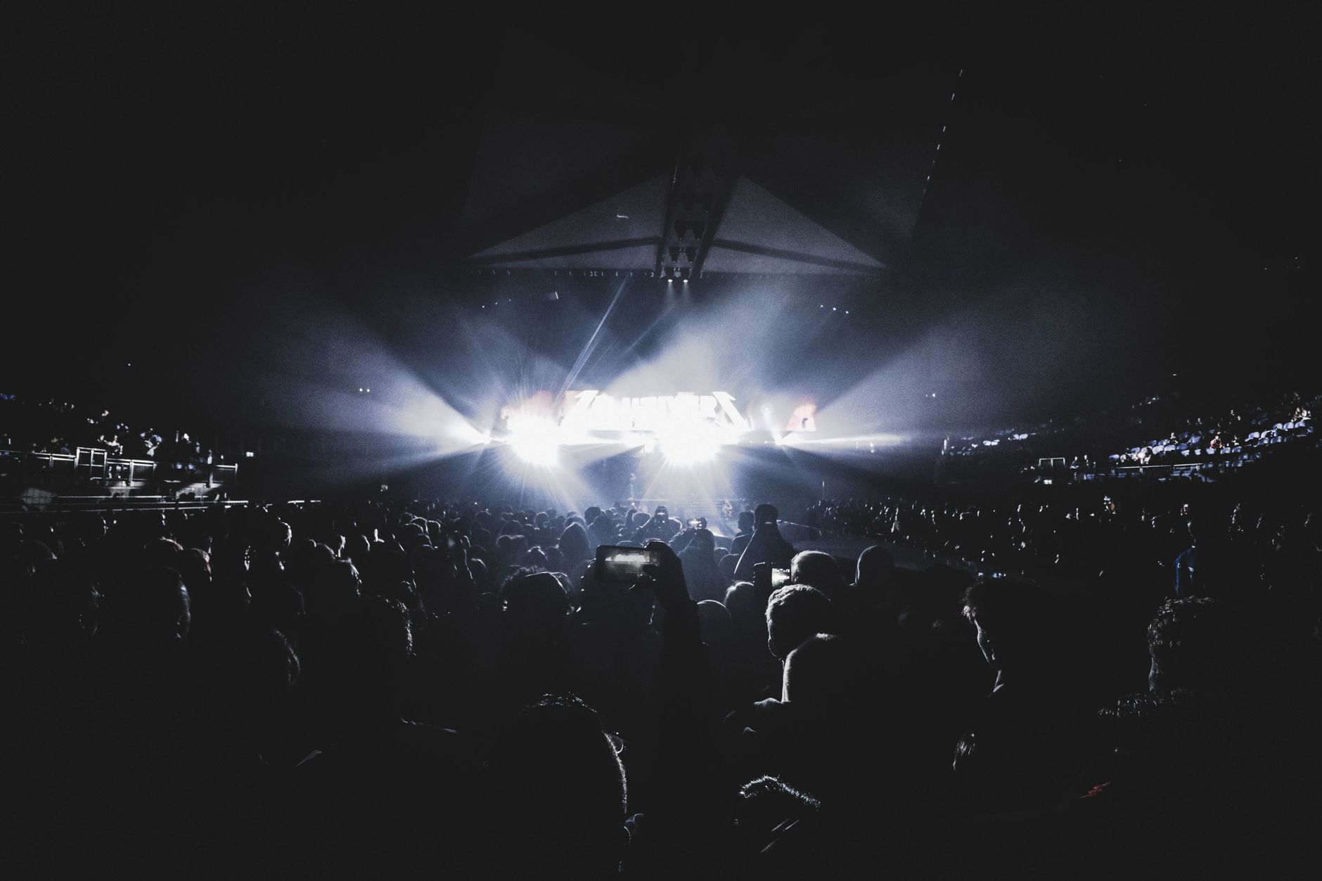 Crowd under stage lighting